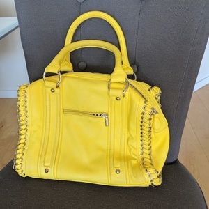Yellow leather purse with silver hardware